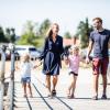 Family walking at Norsminde Marina